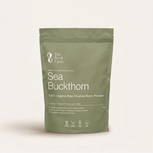 An olive green stand-up pouch of 'The Seed Cycle' Sea Buckthorn berry powder, photographed against a solid off-white background.